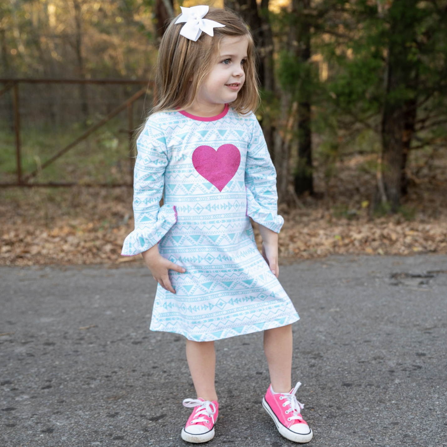 AL Limited Girls Boutique dress featuring blue and pink heart design, soft cotton fabric, and ruffled sleeves, perfect for young girls.